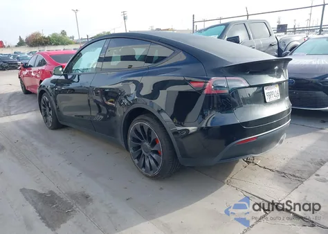 2022 Tesla Model Y Performance Dual Motor All-Wheel Drive z USA, uszkodzony, nr VIN 7SAYGDEF0NF448219